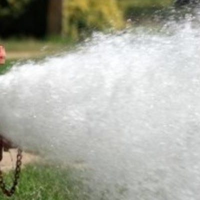 Hydrant Flushing out Into Street