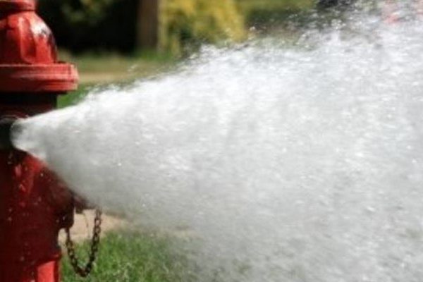 Hydrant Flushing out Into Street