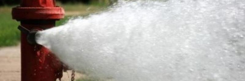 Hydrant Flushing out Into Street