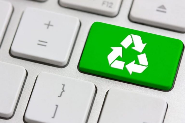 Green Recycling Symbol on Keyboard