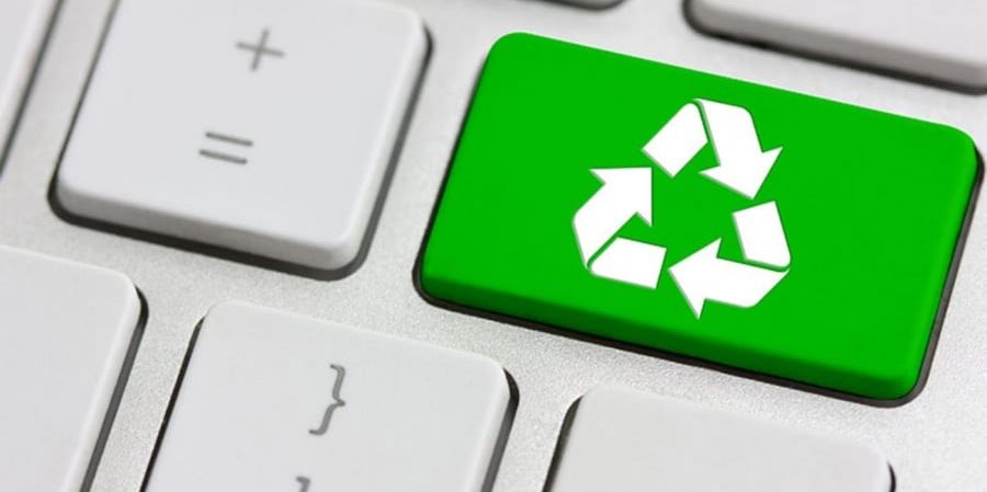 Green Recycling Symbol on Keyboard