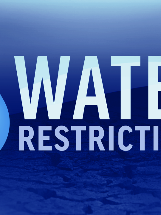 Blue sign showing water droplet