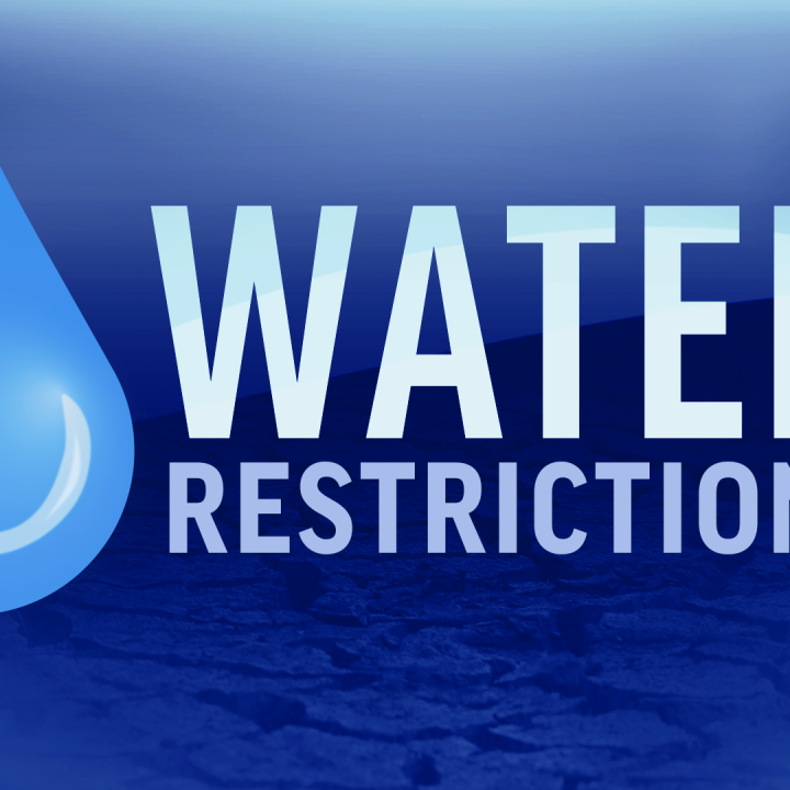 2023 Water Restrictions Blue sign showing water droplet